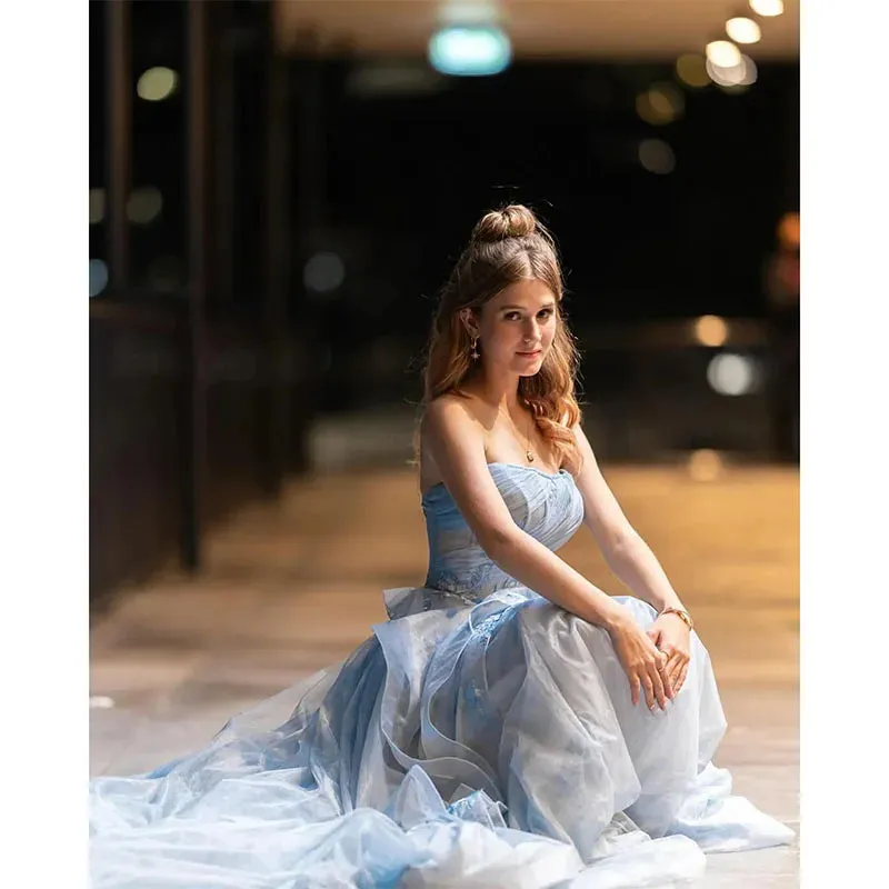 Elegant Blue Strapless A-Line Prom Dress – Puffy Tulle Gown with Ruffles and Appliques for Graduation and Special Occasions